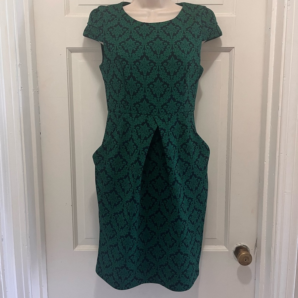Green and black patterned dress by darling. Size XS With pockets